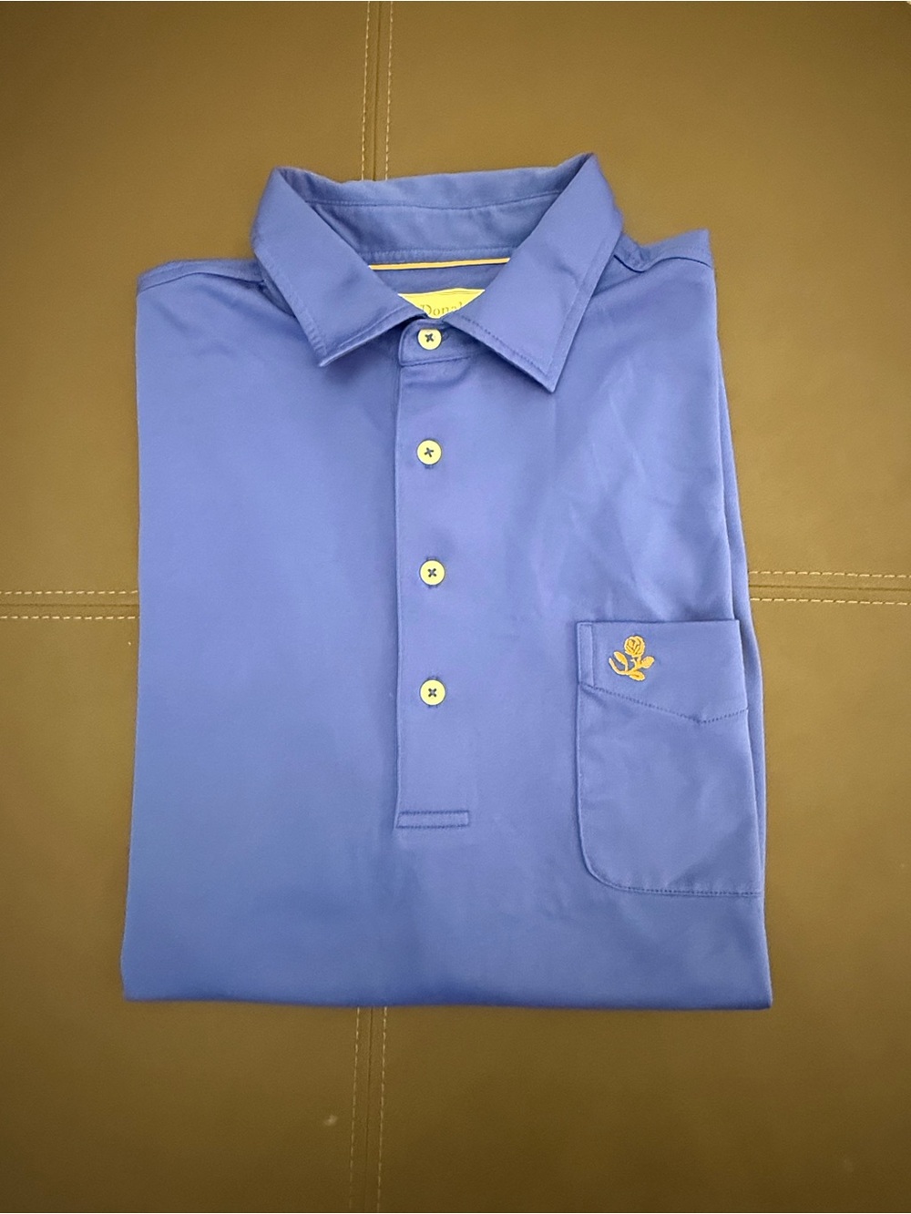 Donald Ross Men’s L Blue Golf Polo with Rose logo on chest